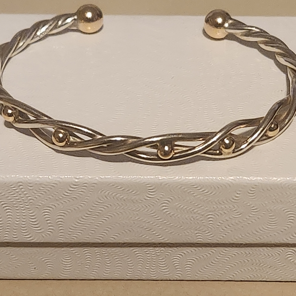 EDEN HAND ARTS 14K GOLD AND STERLING SILVER BRACELET